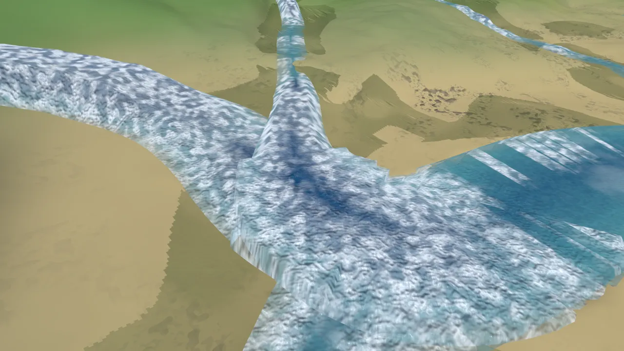 A river junction under the old pipeline, showing a visible stair-step drop between two merging channels